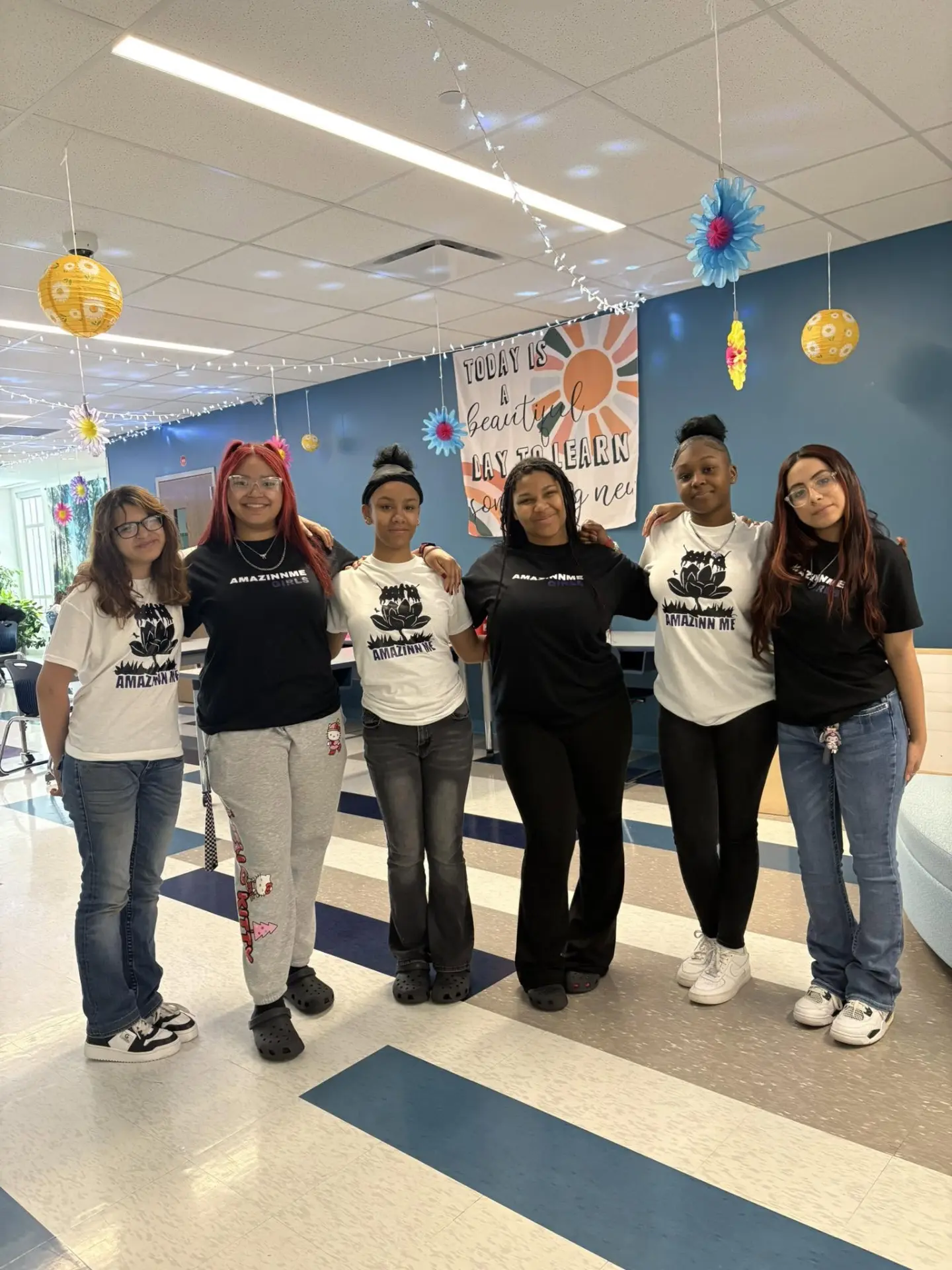AmazinnMe girls in matching t-shirts at a Cleveland school event